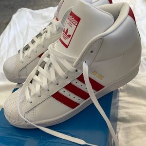 Men’s Brand new red and white Adidas sz 8.5